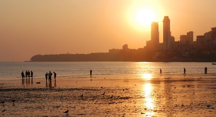 The sun setting over Mumbai seen from Chowpatty Beach