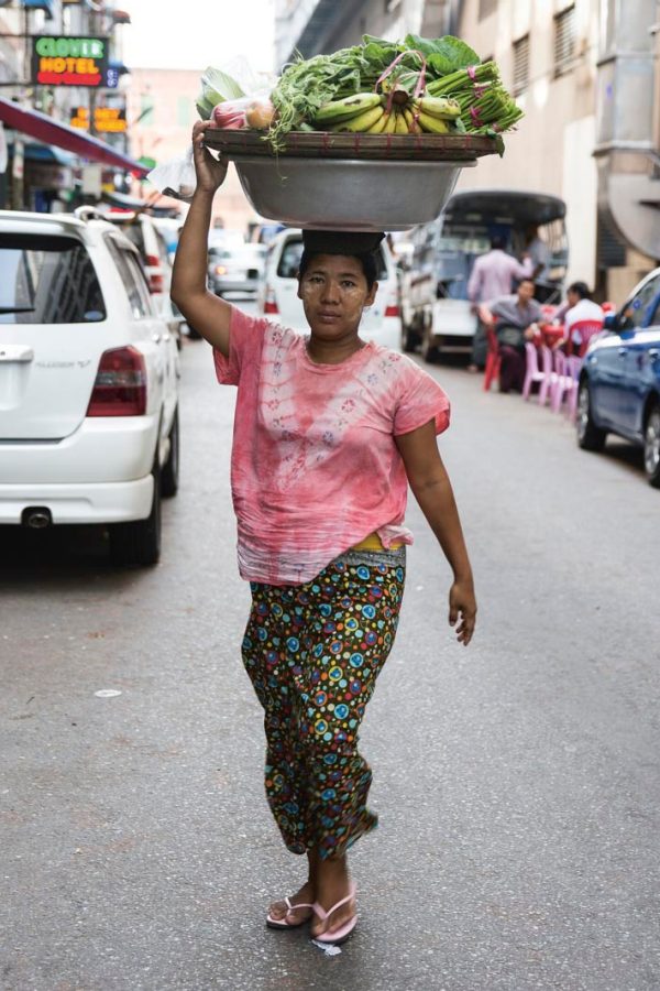 Woman carrying food, Myanmar