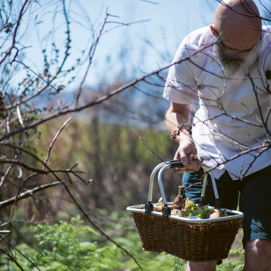 Man holding a basket of food