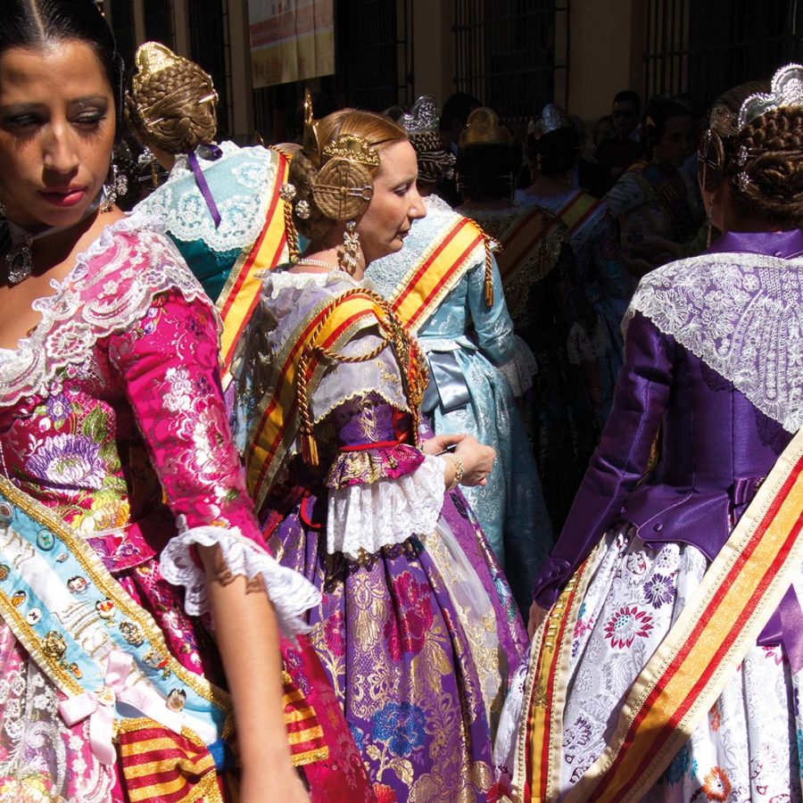 Ladies in bright cultural dresses 