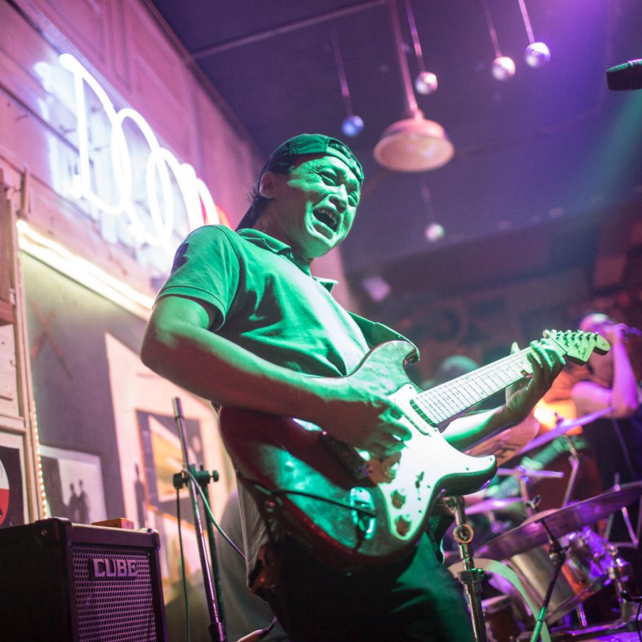 Man singing and playing guitar