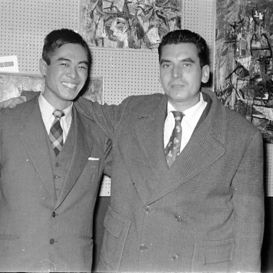 Black and white photo of two men in suits