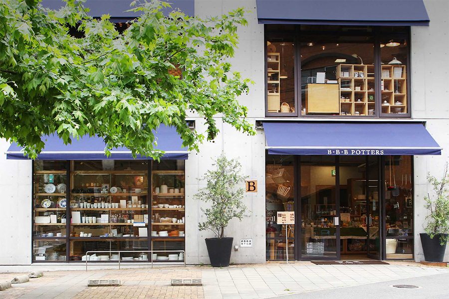 An exterior view of the storefront of B.B.B Potters two-storey café and shop  in Fukuoka, Japan 