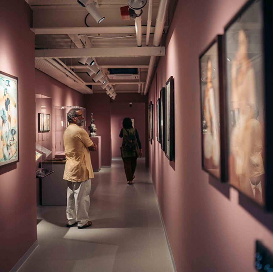 Man looking at artwork. Courtesy image