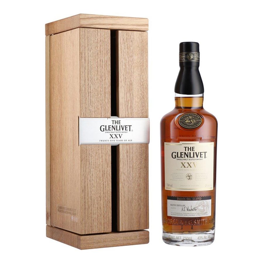 A bottle of Glenlivet XXV whisky complete with a wooden box