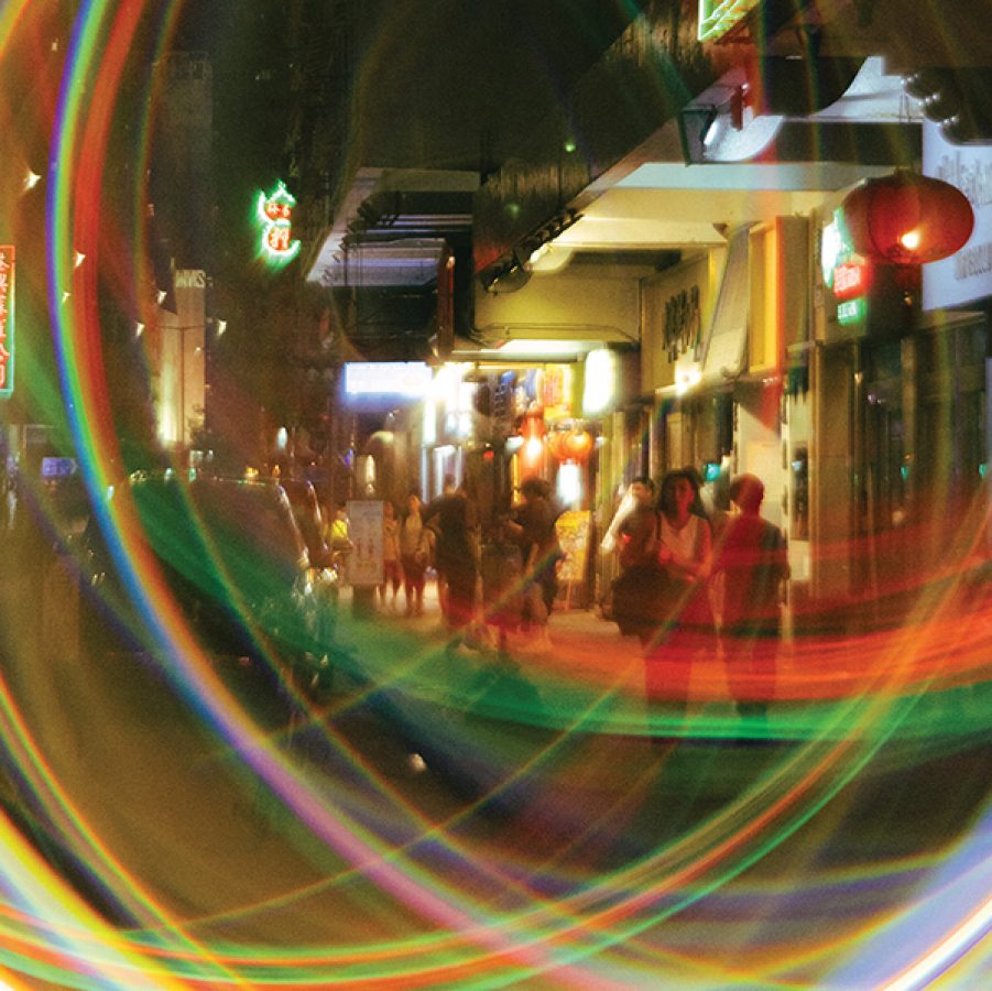 Hong Kong at night through a blurred lens with light effect