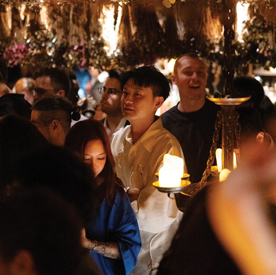 A crowd of people drinking laughing at The Iron Fairies, Hong Kong