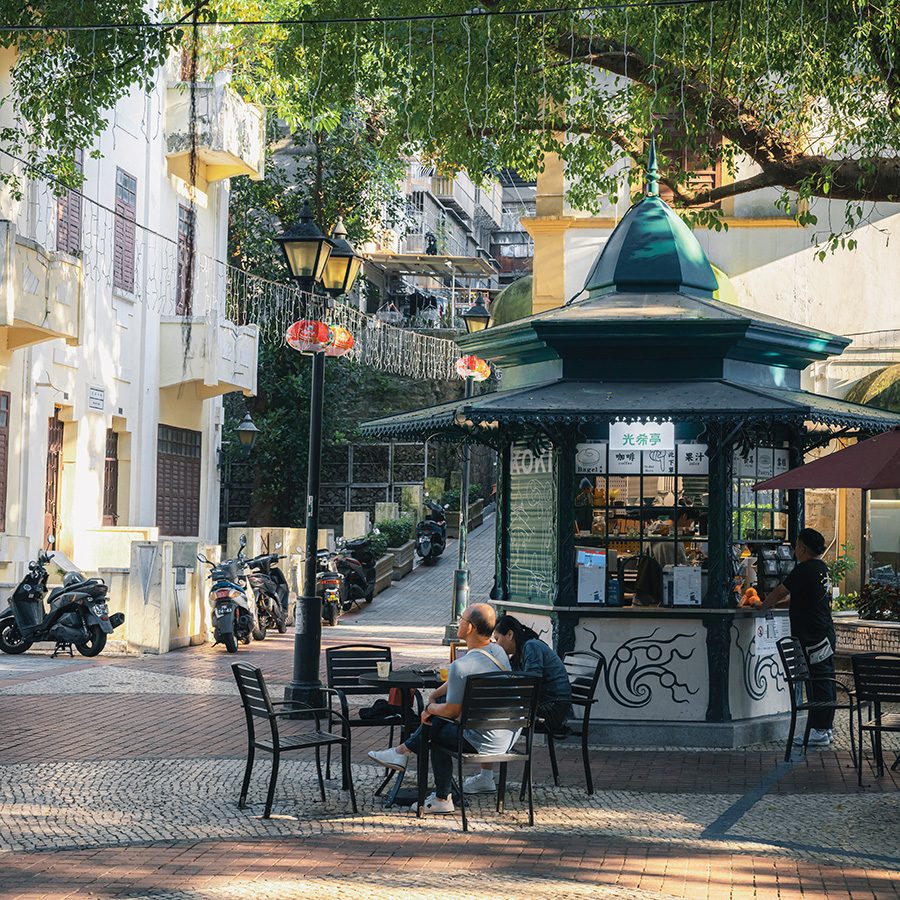 Man sitting out on street in Macao