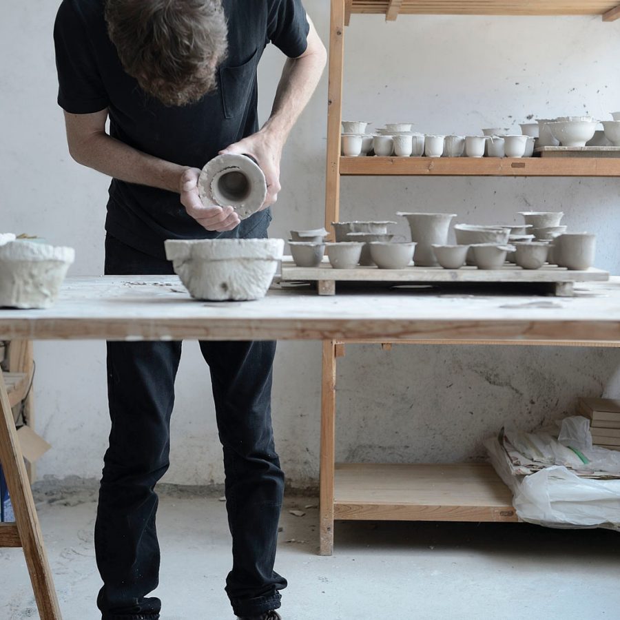 Artist in pottery studio